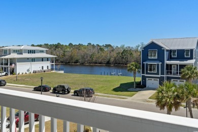 This custom-built raised beach home in the gated community of on Arrowhead Country Club in South Carolina - for sale on GolfHomes.com, golf home, golf lot