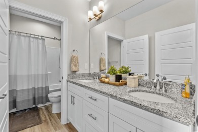 This custom-built raised beach home in the gated community of on Arrowhead Country Club in South Carolina - for sale on GolfHomes.com, golf home, golf lot