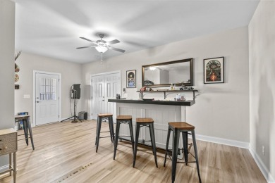 This custom-built raised beach home in the gated community of on Arrowhead Country Club in South Carolina - for sale on GolfHomes.com, golf home, golf lot