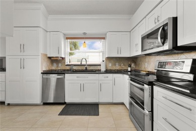 This home will KNOCK YOUR SOCKS OFF!  Being offered TURNKEY, and on El Diablo Executive Golf Course in Florida - for sale on GolfHomes.com, golf home, golf lot