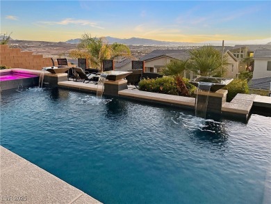 Experience elevated living in this sleek two-story estate on Falls Golf Course in Nevada - for sale on GolfHomes.com, golf home, golf lot