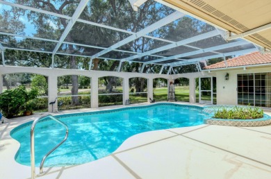 Discover this exceptional residence in the Broadmoor Pines on Palm Aire Country Club of Sarasota in Florida - for sale on GolfHomes.com, golf home, golf lot
