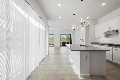 This stunning 3-bedroom, 2.5-bathroom home is nestled within a on Palm Valley Golf Club  in Arizona - for sale on GolfHomes.com, golf home, golf lot
