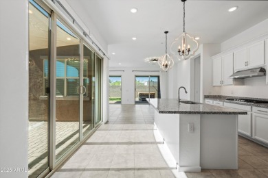 This stunning 3-bedroom, 2.5-bathroom home is nestled within a on Palm Valley Golf Club  in Arizona - for sale on GolfHomes.com, golf home, golf lot