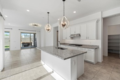 This stunning 3-bedroom, 2.5-bathroom home is nestled within a on Palm Valley Golf Club  in Arizona - for sale on GolfHomes.com, golf home, golf lot