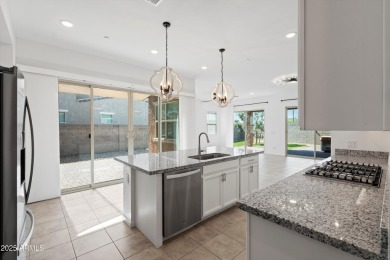 This stunning 3-bedroom, 2.5-bathroom home is nestled within a on Palm Valley Golf Club  in Arizona - for sale on GolfHomes.com, golf home, golf lot