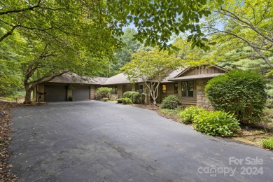 Exceptional home nestled on 1 acre of picturesque grounds with on Kenmure Country Club in North Carolina - for sale on GolfHomes.com, golf home, golf lot