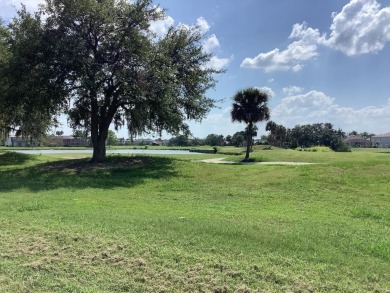 Charming two-bedroom, two-bath residence with a flex room on Remington Golf Club in Florida - for sale on GolfHomes.com, golf home, golf lot
