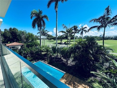 Prime turnkey residence nestled directly in front of the on La Gorce Country Club in Florida - for sale on GolfHomes.com, golf home, golf lot