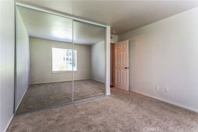 This street-level condo has been completely remodeled and is on Canyon Lakes Country Club in California - for sale on GolfHomes.com, golf home, golf lot