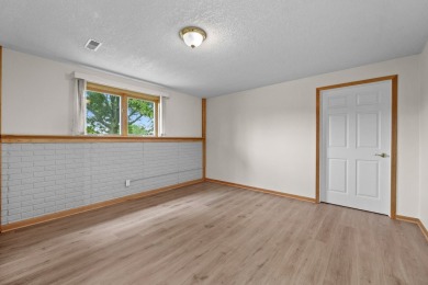 Welcome to your new home, ideally situated on a corner lot and on Lake Panorama National Golf Course in Iowa - for sale on GolfHomes.com, golf home, golf lot