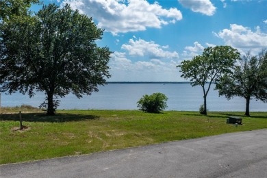 OPEN waterfront lot with gorgeous views to build your dream home on Cedar Creek Country Club in Texas - for sale on GolfHomes.com, golf home, golf lot