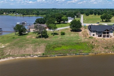 OPEN waterfront lot with gorgeous views to build your dream home on Cedar Creek Country Club in Texas - for sale on GolfHomes.com, golf home, golf lot