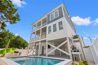 Welcome to coastal luxury just blocks from the beach! This on Beachwood Golf Club in South Carolina - for sale on GolfHomes.com, golf home, golf lot