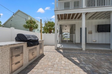 Welcome to coastal luxury just blocks from the beach! This on Beachwood Golf Club in South Carolina - for sale on GolfHomes.com, golf home, golf lot