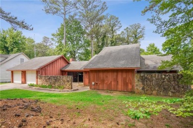 This charming Mid-Century home in Lithonia's Saddlewood on Mystery Valley Golf Course in Georgia - for sale on GolfHomes.com, golf home, golf lot