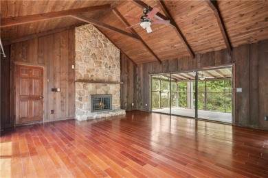 This charming Mid-Century home in Lithonia's Saddlewood on Mystery Valley Golf Course in Georgia - for sale on GolfHomes.com, golf home, golf lot