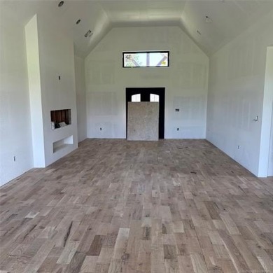 This newly constructed soon to be masterpiece was crafted with on The Coves Golf Course in Oklahoma - for sale on GolfHomes.com, golf home, golf lot