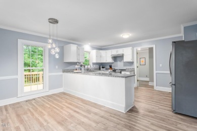 Enjoy easy, single-level living in one of Greensboro's most on Cardinal Golf and Country Club in North Carolina - for sale on GolfHomes.com, golf home, golf lot