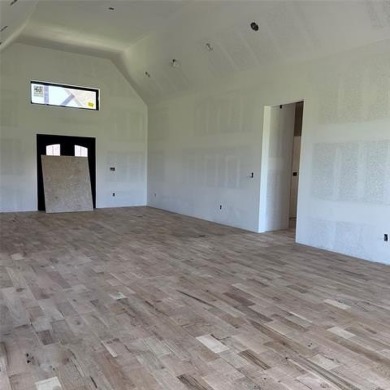 This newly constructed soon to be masterpiece was crafted with on The Coves Golf Course in Oklahoma - for sale on GolfHomes.com, golf home, golf lot