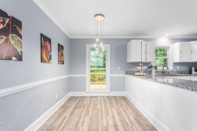 Enjoy easy, single-level living in one of Greensboro's most on Cardinal Golf and Country Club in North Carolina - for sale on GolfHomes.com, golf home, golf lot
