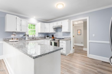 Enjoy easy, single-level living in one of Greensboro's most on Cardinal Golf and Country Club in North Carolina - for sale on GolfHomes.com, golf home, golf lot