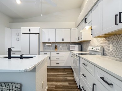 This recently updated duplex VILLA in THE PRESERVE in HERONS on Herons Glen Golf and Country Club in Florida - for sale on GolfHomes.com, golf home, golf lot
