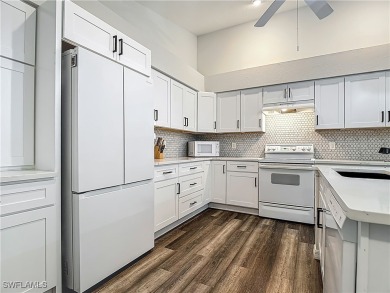This recently updated duplex VILLA in THE PRESERVE in HERONS on Herons Glen Golf and Country Club in Florida - for sale on GolfHomes.com, golf home, golf lot