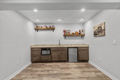 This stunning 5-bed, 3-bath home on 2.5 acres offers the perfect on Washington County Golf Course in Wisconsin - for sale on GolfHomes.com, golf home, golf lot