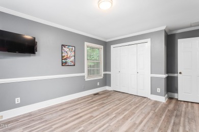 Enjoy easy, single-level living in one of Greensboro's most on Cardinal Golf and Country Club in North Carolina - for sale on GolfHomes.com, golf home, golf lot