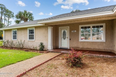 Charming Coastal Retreat - Fully Updated & Prime LocationWelcome on Holiday Golf Club in Florida - for sale on GolfHomes.com, golf home, golf lot
