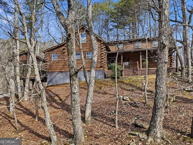 This Authentic Log Cabin Kept in It's Original Condition on The Highlands Course at Lake Arrowhead in Georgia - for sale on GolfHomes.com, golf home, golf lot