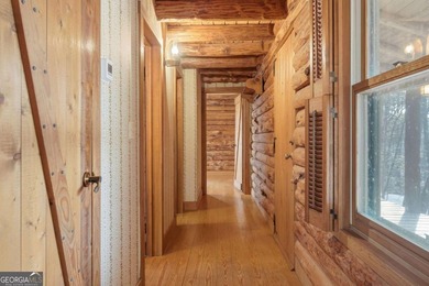 This Authentic Log Cabin Kept in It's Original Condition on The Highlands Course at Lake Arrowhead in Georgia - for sale on GolfHomes.com, golf home, golf lot