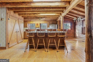 This Authentic Log Cabin Kept in It's Original Condition on The Highlands Course at Lake Arrowhead in Georgia - for sale on GolfHomes.com, golf home, golf lot