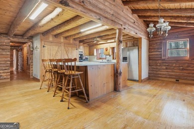 This Authentic Log Cabin Kept in It's Original Condition on The Highlands Course at Lake Arrowhead in Georgia - for sale on GolfHomes.com, golf home, golf lot