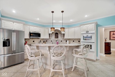 Experience luxury living in this stunning 6-bedroom, 5-bathroom on Edgewood Golf Club in Indiana - for sale on GolfHomes.com, golf home, golf lot