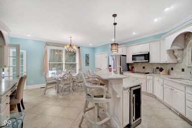 Experience luxury living in this stunning 6-bedroom, 5-bathroom on Edgewood Golf Club in Indiana - for sale on GolfHomes.com, golf home, golf lot