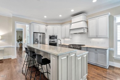 This STUNNING custom home, located in the prestigious 12 OAKS on The Club At Twelve Oaks in North Carolina - for sale on GolfHomes.com, golf home, golf lot