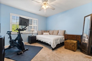 This beauty is priced to sell! Discover this spacious two-story on Carrollwood Country Club in Florida - for sale on GolfHomes.com, golf home, golf lot