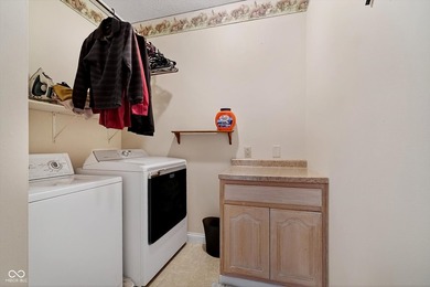 Experience luxury living in this stunning 6-bedroom, 5-bathroom on Edgewood Golf Club in Indiana - for sale on GolfHomes.com, golf home, golf lot