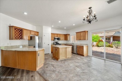Set apart at the end of a cul-de-sac, this peaceful home boasts on Verde Santa Fe Golf Club in Arizona - for sale on GolfHomes.com, golf home, golf lot