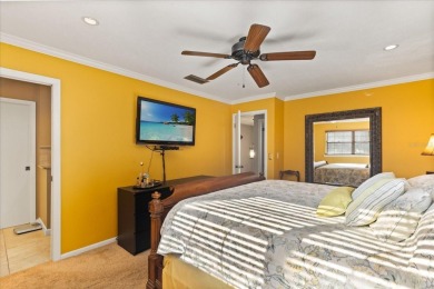 This beauty is priced to sell! Discover this spacious two-story on Carrollwood Country Club in Florida - for sale on GolfHomes.com, golf home, golf lot