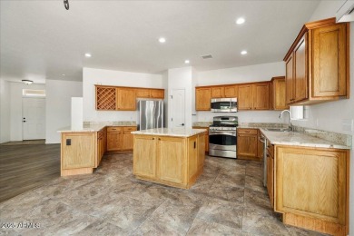 Set apart at the end of a cul-de-sac, this peaceful home boasts on Verde Santa Fe Golf Club in Arizona - for sale on GolfHomes.com, golf home, golf lot