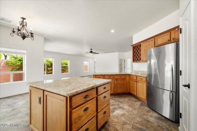 Set apart at the end of a cul-de-sac, this peaceful home boasts on Verde Santa Fe Golf Club in Arizona - for sale on GolfHomes.com, golf home, golf lot