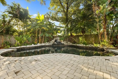 This beauty is priced to sell! Discover this spacious two-story on Carrollwood Country Club in Florida - for sale on GolfHomes.com, golf home, golf lot