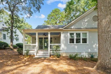 Welcome to this charming cottage nestled in the sought-after on Great Waters Course At Reynolds Plantation in Georgia - for sale on GolfHomes.com, golf home, golf lot