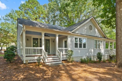 Welcome to this charming cottage nestled in the sought-after on Great Waters Course At Reynolds Plantation in Georgia - for sale on GolfHomes.com, golf home, golf lot