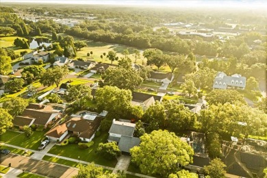 This beauty is priced to sell! Discover this spacious two-story on Carrollwood Country Club in Florida - for sale on GolfHomes.com, golf home, golf lot