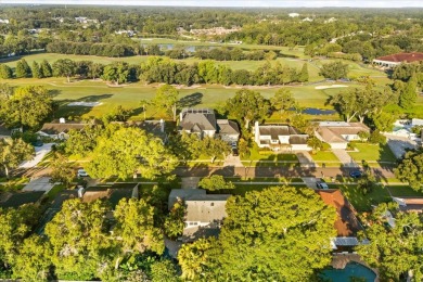 This beauty is priced to sell! Discover this spacious two-story on Carrollwood Country Club in Florida - for sale on GolfHomes.com, golf home, golf lot