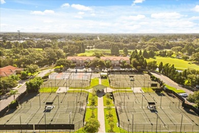 This beauty is priced to sell! Discover this spacious two-story on Carrollwood Country Club in Florida - for sale on GolfHomes.com, golf home, golf lot